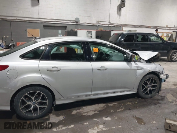 2015 Ford Focus SE with VIN 1FADP3F24FL272863, listed as a IAAI auction lot 41561084 with 103,875 mi miles. Bid and sale history available at carsss.com. Image 14.
