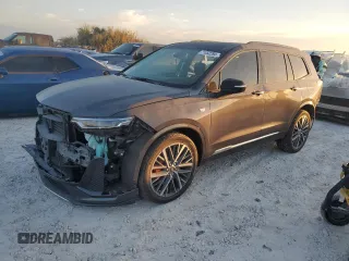 2023 Cadillac XT6 AWD Sport with VIN 1GYKPGRS6PZ108561, listed as a Copart auction lot 71052284 with 31,496 mi miles and Salvage Title. Bid and sale history available at DreamBid. Image 1.