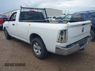 2019 Ram 1500 Classic Tradesman with VIN 3C6JR6DT8KG506165, listed as a IAAI auction lot 40721848 with 323,427 mi miles. Bid and sale history available at carsss.com. Image 3.