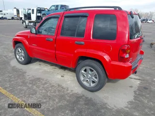 2004 Jeep Liberty Limited with VIN 1J4GL58KX4W323414, listed as a IAAI auction lot 41913205 with 180,014 mi miles. Bid and sale history available at carsss.com. Image 3.