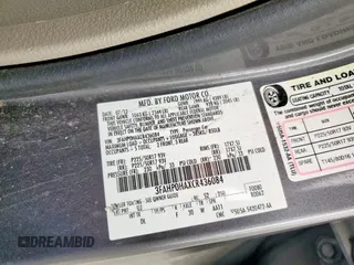 2012 Ford Fusion SE z VIN 3FAHP0HAXCR436084, wystawiony jako Copart lot #57390385 z przebiegiem 88 645 mil mil oraz Szkoda całkowita • Salvage title. Historia ofert i sprzedaży dostępna na DreamBid. Obrazek 12.