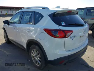 2015 Mazda CX-5 Sport with VIN JM3KE2BE3F0449722, listed as a IAAI auction lot 41825810 with 181,949 mi miles and . Bid and sale history available at DreamBid. Image 3.