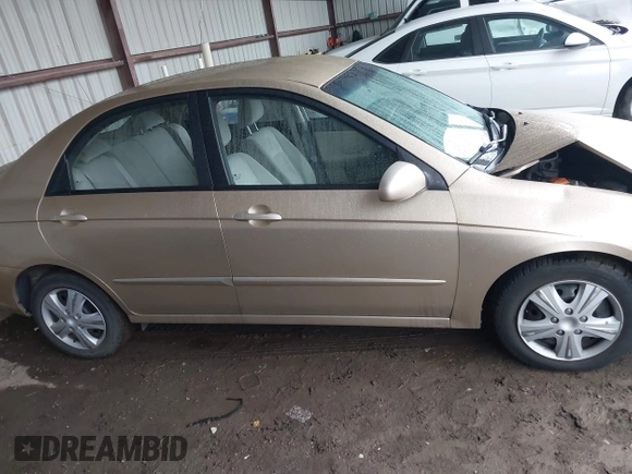 2009 Kia Spectra EX z VIN KNAFE221395647549, wystawiony jako IAAI lot #42408076 z przebiegiem 227 302 mil mil oraz . Historia ofert i sprzedaży dostępna na DreamBid. Obrazek 13.