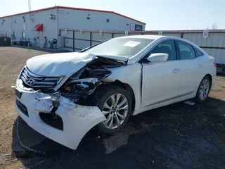 2014 Hyundai Azera with VIN KMHFG4JGXEA345249, listed as a IAAI auction lot 42118221 with 66,567 mi miles and . Bid and sale history available at carsss.com. Image 18.