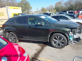 2022 Lexus RX 350 z VIN 2T2HZMDA9NC345426, wystawiony jako IAAI lot #40806565 z przebiegiem 17 592 mil mil oraz . Historia ofert i sprzedaży dostępna na DreamBid. Obrazek 14.