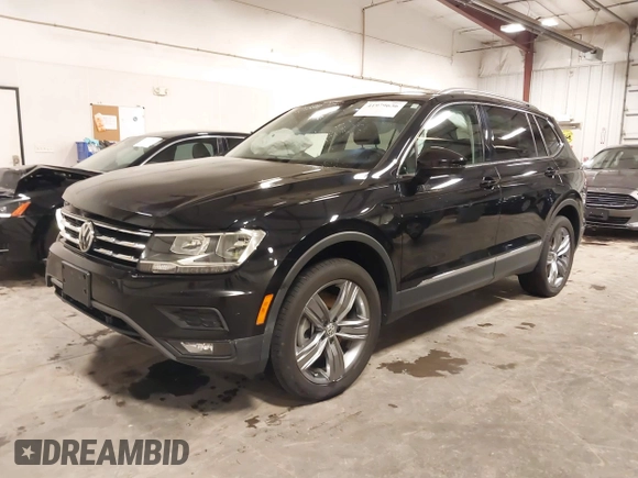 2021 Volkswagen Tiguan SE with VIN 3VV2B7AXXMM034880, listed as a IAAI auction lot 41979636 with 34,490 mi miles and . Bid and sale history available at DreamBid. Image 20.