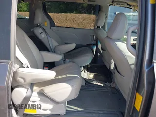 2014 Toyota Sienna XLE z VIN 5TDYK3DC4ES493852, wystawiony jako IAAI lot #42096495 z przebiegiem 145 943 mil mil oraz . Historia ofert i sprzedaży dostępna na DreamBid. Obrazek 8.
