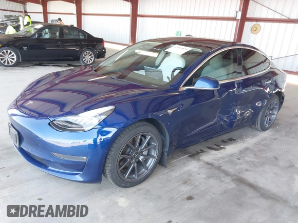 2019 Tesla Model 3 Mid Range z VIN 5YJ3E1EA3KF314882, wystawiony jako IAAI lot #42009874 z przebiegiem 160 381 mil mil oraz . Historia ofert i sprzedaży dostępna na DreamBid. Obrazek 19.