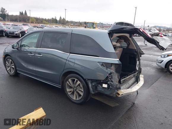 2021 Honda Odyssey Touring with VIN 5FNRL6H86MB001298, listed as a IAAI auction lot 41721738 with 85,680 mi miles. Bid and sale history available at carsss.com. Image 3.