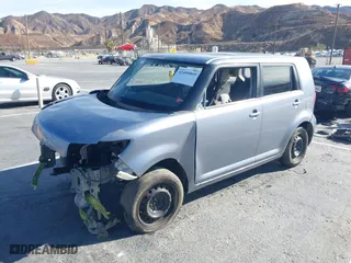 2012 Scion xB with VIN JTLZE4FE8CJ016906, listed as a IAAI auction lot 41409809 with 1 mi miles. Bid and sale history available at carsss.com. Image 2.