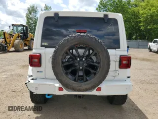 2021 Jeep Wrangler Unlimited Sahara with VIN 1C4JJXP63MW807717, listed as a Copart auction lot 59731465 with 50,799 mi miles and Clean title. Bid and sale history available at DreamBid. Image 6.