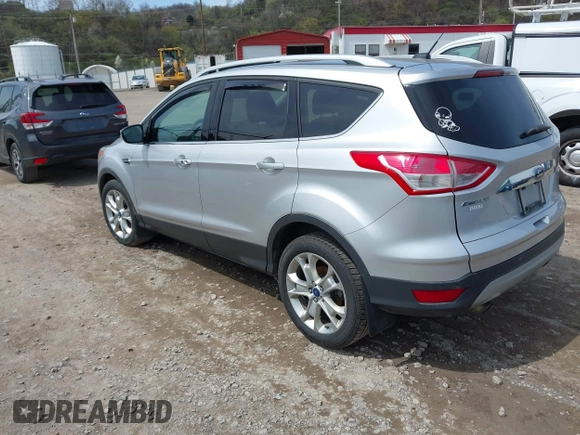 2016 Ford Escape Titanium with VIN 1FMCU9JX3GUA62802, listed as a IAAI auction lot 42001690 with 124,452 mi miles. Bid and sale history available at carsss.com. Image 3.