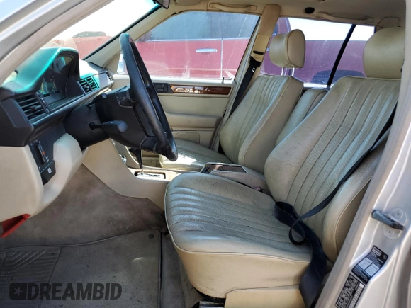 1994 Mercedes-Benz E with VIN WDBEA92E2RF283381, listed as a Copart auction lot 50025645 with 131,140 mi miles and Salvage Title. Bid and sale history available at DreamBid. Image 7.