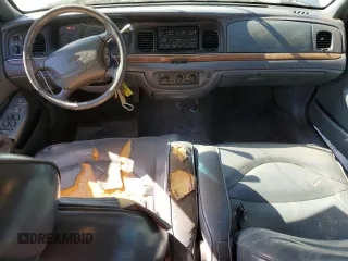 1997 Ford Crown Victoria LX z VIN 2FALP74W1VX218463, wystawiony jako Copart lot #52851045 z przebiegiem 236 098 mil mil oraz Szkoda całkowita • Salvage title. Historia ofert i sprzedaży dostępna na DreamBid. Obrazek 8.