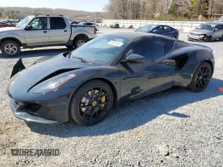 2024 Lotus Emira First Edition z VIN SCCLEKAX6RHB10413, wystawiony jako Copart lot #50034445 z przebiegiem 9430 mil mil oraz Szkody całkowita. Historia ofert i sprzedaży dostępna na DreamBid. Obrazek 1.