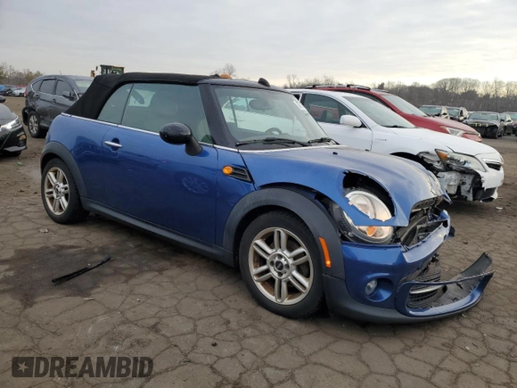 2014 MINI Convertible with VIN WMWZN3C53ET861225, listed as a Copart auction lot 87791665 with 104,151 mi miles and Salvage title. Bid and sale history available at DreamBid. Image 4.