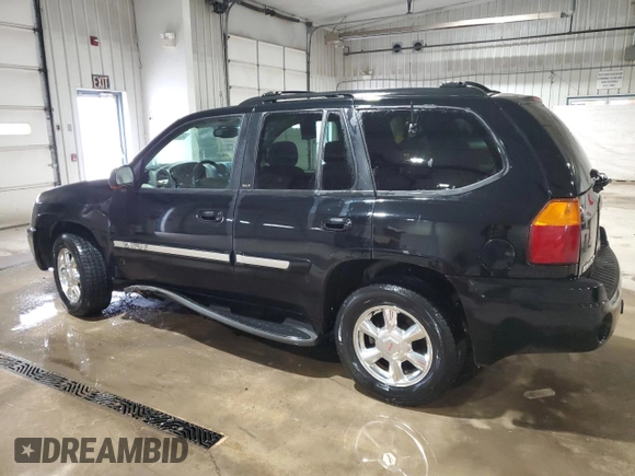 2003 GMC Envoy SLT with VIN 1GKDT13S232251871, listed as a Copart auction lot 45306785 with 174,303 mi miles and Salvage Title. Bid and sale history available at carsss.com. Image 2.