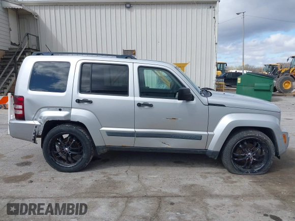 2009 Jeep Liberty Sport with VIN 1J8GN28K39W520228, listed as a IAAI auction lot 41961381 with 196,187 mi miles. Bid and sale history available at carsss.com. Image 14.