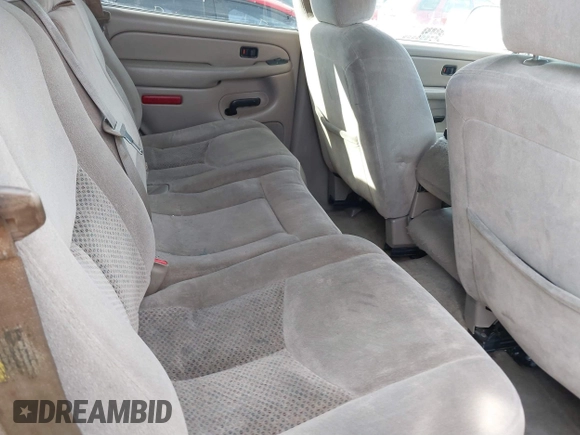 2005 Chevrolet Tahoe LS with VIN 1GNEC13V25R204089, listed as a IAAI auction lot 41075336 with 164,937 mi miles and . Bid and sale history available at DreamBid. Image 7.