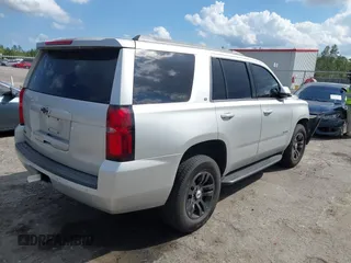 2018 Chevrolet Tahoe LT with VIN 1GNSCBKCXJR367852, listed as a IAAI auction lot 41549304 with 151,684 mi miles and . Bid and sale history available at DreamBid. Image 4.