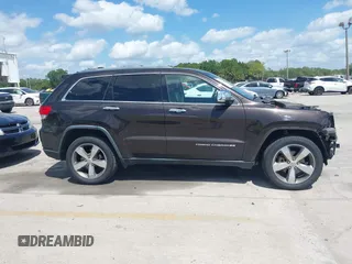 2016 Jeep Grand Cherokee Limited 75th Anniversary with VIN 1C4RJFBG0GC492720, listed as a IAAI auction lot 42073930 with 119,539 mi miles and . Bid and sale history available at DreamBid. Image 14.