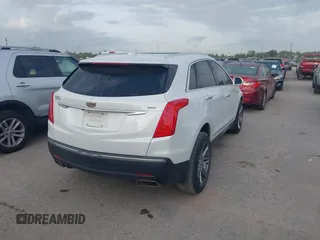 2017 Cadillac XT5 Luxury FWD with VIN 1GYKNBRS2HZ108745, listed as a IAAI auction lot 42022579 with 147,413 mi miles. Bid and sale history available at carsss.com. Image 4.