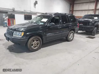 2003 Jeep Grand Cherokee Laredo with VIN 1J4GW48S63C552366, listed as a IAAI auction lot 41861501 with 227,464 mi miles. Bid and sale history available at carsss.com. Image 2.