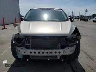 2017 Ford Escape S with VIN 1FMCU0F77HUE25995, listed as a Copart auction lot 56180845 with 105,006 mi miles and Salvage title. Bid and sale history available at DreamBid. Image 5.