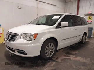 2015 Chrysler Town & Country Touring with VIN 2C4RC1BG9FR626482, listed as a IAAI auction lot 41879865 with 129,694 mi miles and . Bid and sale history available at DreamBid. Image 2.