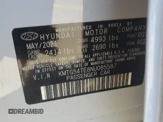 2022 Genesis G70 3.3T with VIN KMTG54TE8NU085587, listed as a Copart auction lot 57897535 with 23,785 mi miles and Salvage title. Bid and sale history available at DreamBid. Image 12.