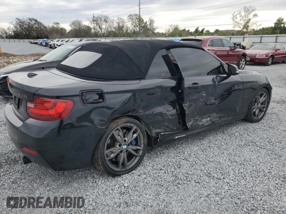 2015 BMW 2 Series M235i with VIN WBA1M1C54FV393578, listed as a Copart auction lot 88945735 with 95,713 mi miles and Salvage title. Bid and sale history available at DreamBid. Image 3.