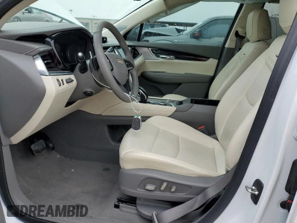 2024 Cadillac XT6 FWD Premium Luxury with VIN 1GYKPCRS2RZ717884, listed as a Copart auction lot 44048215 with 18,045 mi miles and Salvage Title. Bid and sale history available at carsss.com. Image 7.