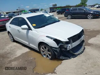2016 Cadillac ATS Standard RWD with VIN 1G6AA5RAXG0116345, listed as a IAAI auction lot 42484692 with 74,123 mi miles and . Bid and sale history available at DreamBid. Image 1.