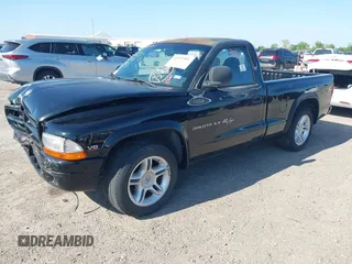 2000 Dodge Dakota SLT with VIN 1B7GL26ZXYS720333, listed as a IAAI auction lot 41972966 with 111,584 mi miles and . Bid and sale history available at carsss.com. Image 2.