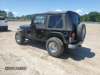 1999 Jeep Wrangler SE with VIN 1J4FY29P3XP408468, listed as a Copart auction lot 55537335 with Not provided miles and Salvage title. Bid and sale history available at DreamBid. Image 3.