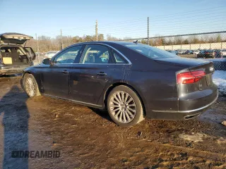 2015 Audi A8 z VIN WAUJGAFD4FN028750, wystawiony jako Copart lot #89099265 z przebiegiem 44 149 mil mil oraz Szkoda całkowita • Salvage title. Historia ofert i sprzedaży dostępna na DreamBid. Obrazek 2.