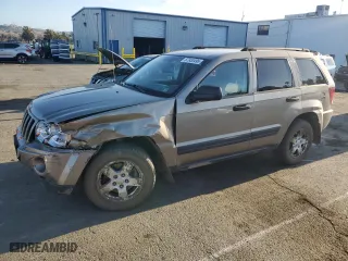 2006 Jeep Grand Cherokee Laredo with VIN 1J4GR48K06C311821, listed as a Copart auction lot 87953495 with 201,079 mi miles and Salvage Title. Bid and sale history available at carsss.com. Image 1.