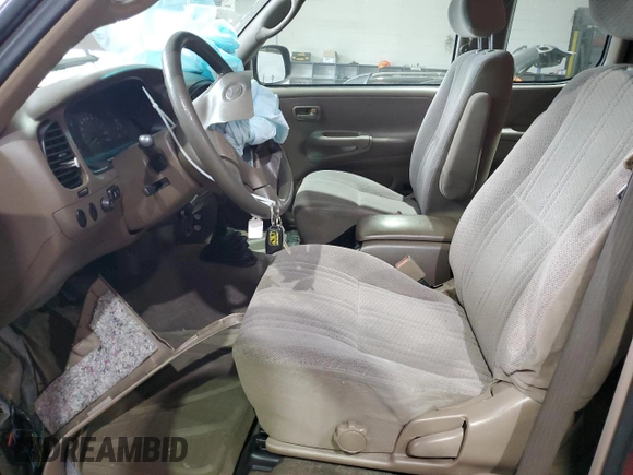 2002 Toyota Tundra SR5 with VIN 5TBRN34132S328311, listed as a Copart auction lot 83613504 with 123,354 mi miles and Salvage Title. Bid and sale history available at DreamBid. Image 7.