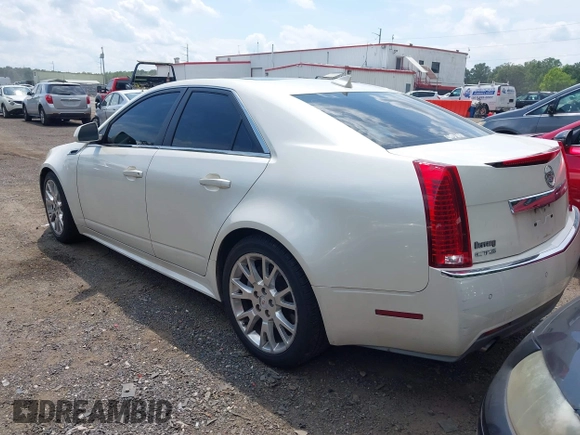2011 Cadillac CTS Premium with VIN 1G6DP5ED2B0113072, listed as a IAAI auction lot 42797153 with 171,779 mi miles and . Bid and sale history available at DreamBid. Image 3.