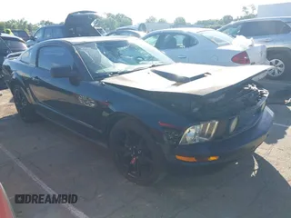 2005 Ford Mustang Deluxe z VIN 1ZVFT80N355224477, wystawiony jako IAAI lot #42534614 z przebiegiem 154 663 mil mil oraz . Historia ofert i sprzedaży dostępna na DreamBid. Obrazek 1.