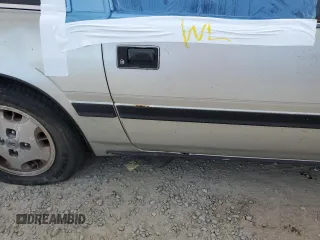 1984 Nissan 300ZX z VIN JN1HZ16S5EX016042, wystawiony jako Copart lot #86071904 z przebiegiem Nie podano mil oraz Szkoda całkowita • Salvage title. Historia ofert i sprzedaży dostępna na DreamBid. Obrazek 12.