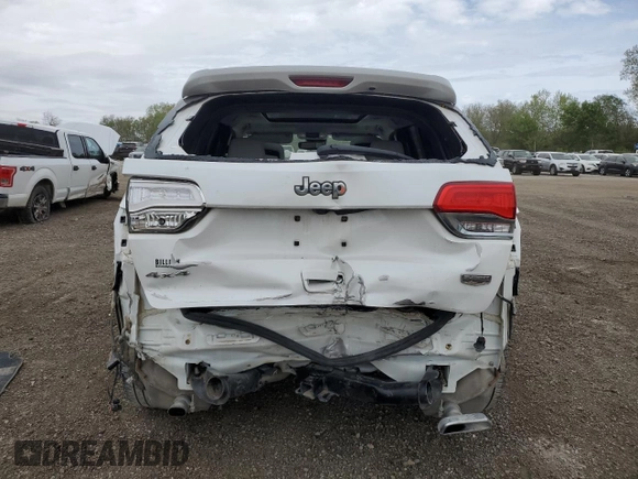 2019 Jeep Grand Cherokee Summit with VIN 1C4RJFJT4KC848996, listed as a Copart auction lot 54974925 with 106,517 mi miles and Salvage title. Bid and sale history available at DreamBid. Image 6.