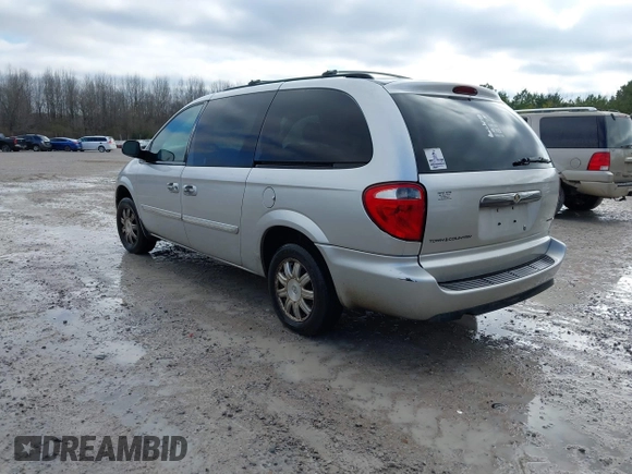 2006 Chrysler Town & Country Touring with VIN 2A4GP54LX6R859617, listed as a IAAI auction lot 41484842 with 283,845 mi miles and . Bid and sale history available at DreamBid. Image 3.
