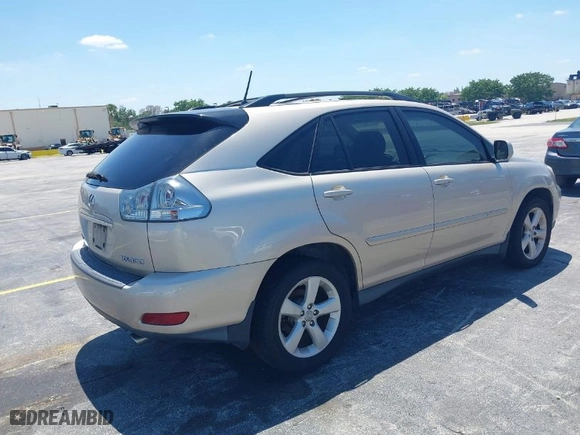 2005 Lexus RX 330 with VIN 2T2HA31U05C059173, listed as a IAAI auction lot 42039940 with 165,393 mi miles. Bid and sale history available at carsss.com. Image 4.