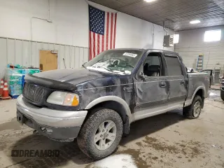 2002 Ford F-150 XLT with VIN 1FTRW08L12KE11970, listed as a Copart auction lot 45299665 with 173,802 mi miles and Salvage Title. Bid and sale history available at carsss.com. Image 1.