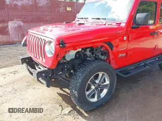 2018 Jeep Wrangler Unlimited Sahara z VIN 1C4HJXEN7JW224927, wystawiony jako IAAI lot #41515557 z przebiegiem 81 138 mil mil oraz . Historia ofert i sprzedaży dostępna na DreamBid. Obrazek 6.