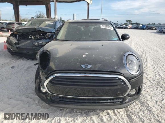 2016 MINI Clubman z VIN WMWLN5C51G2B28099, wystawiony jako Copart lot #55139845 z przebiegiem 89 683 mil mil oraz Szkoda całkowita • Salvage title. Historia ofert i sprzedaży dostępna na DreamBid. Obrazek 5.