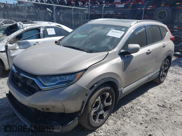 2018 Honda CR-V Touring with VIN 5J6RW1H98JL000031, listed as a IAAI auction lot 40605651 with 129,516 mi miles and . Bid and sale history available at DreamBid. Image 16.