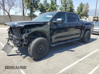2022 Toyota Tundra SR5 with VIN 5TFLA5DB3NX027677, listed as a Copart auction lot 52427035 with 62,881 mi miles and Salvage title. Bid and sale history available at DreamBid. Image 1.