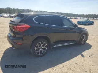 2021 BMW X1 xDrive28i z VIN WBXJG9C07M5S73464, wystawiony jako Copart lot #50374525 z przebiegiem 117 828 mil mil oraz Tytuł czysty. Historia ofert i sprzedaży dostępna na DreamBid. Obrazek 3.